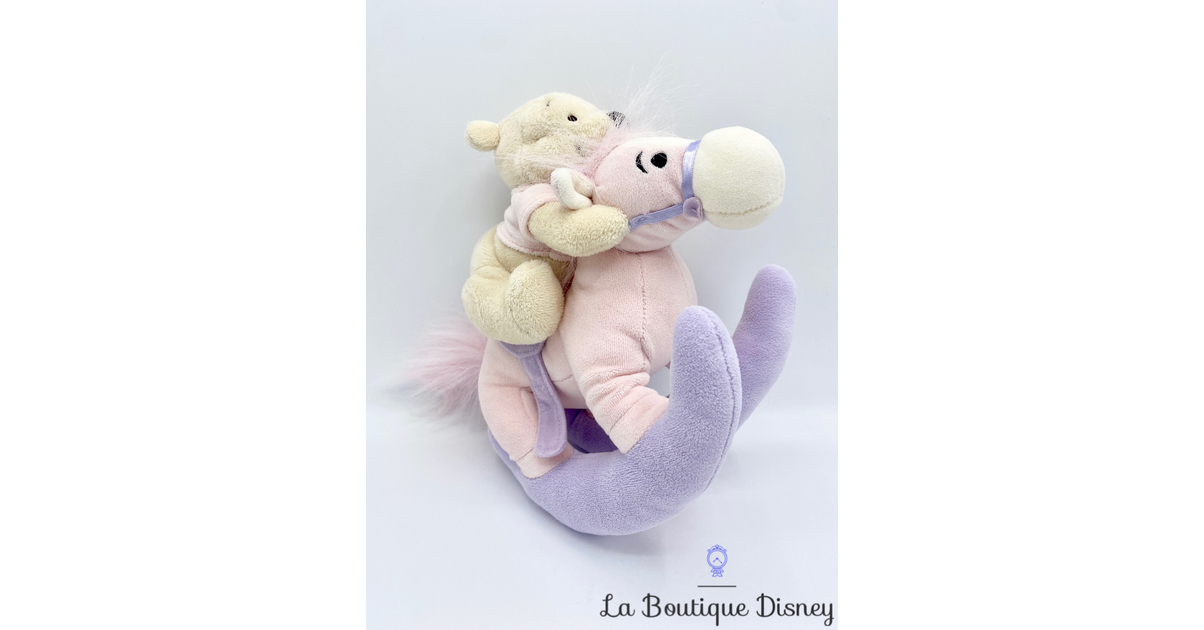 Winnie store bascule peluche